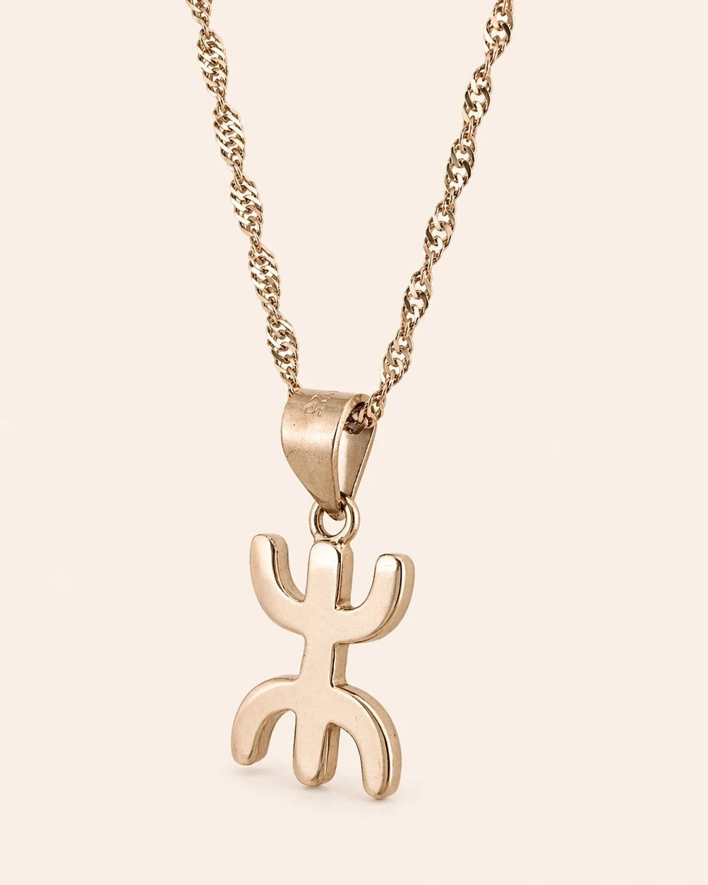 Amzay Yaz pendant necklace in gold and silver finish, 40cm chain with Amazigh symbol.