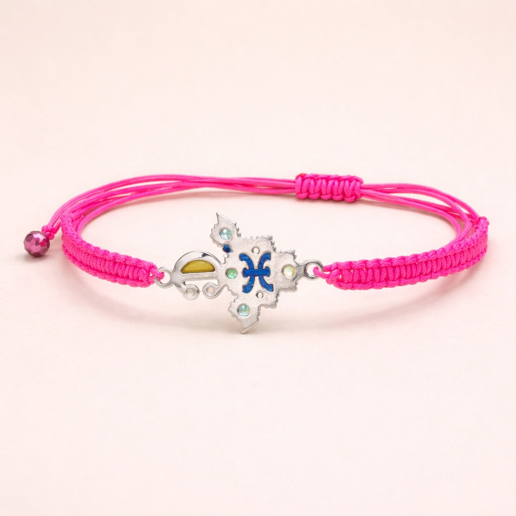 Zirzita adjustable cord bracelet with an artisan-crafted Moroccan silver Amazigh fibula charm.