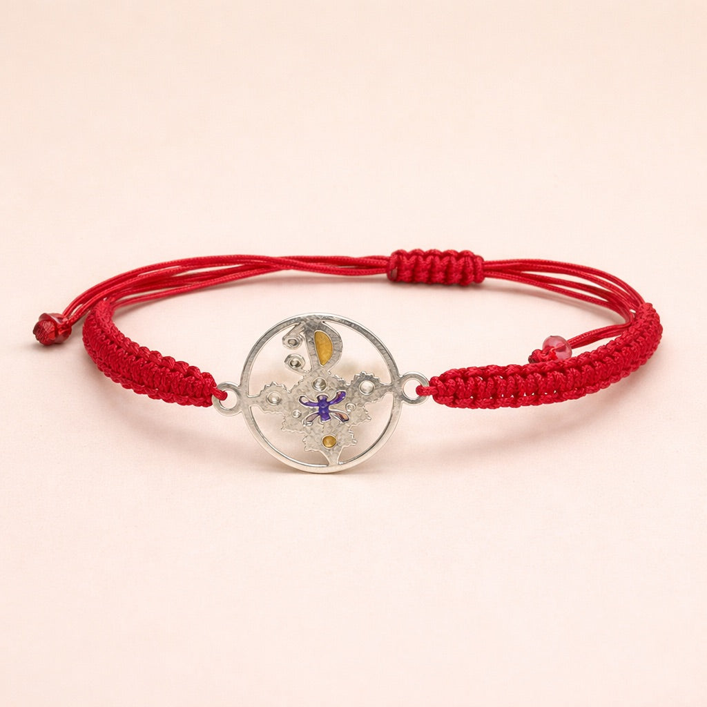Zirzita adjustable cord bracelet with an artisan-crafted Moroccan silver Amazigh fibula charm.