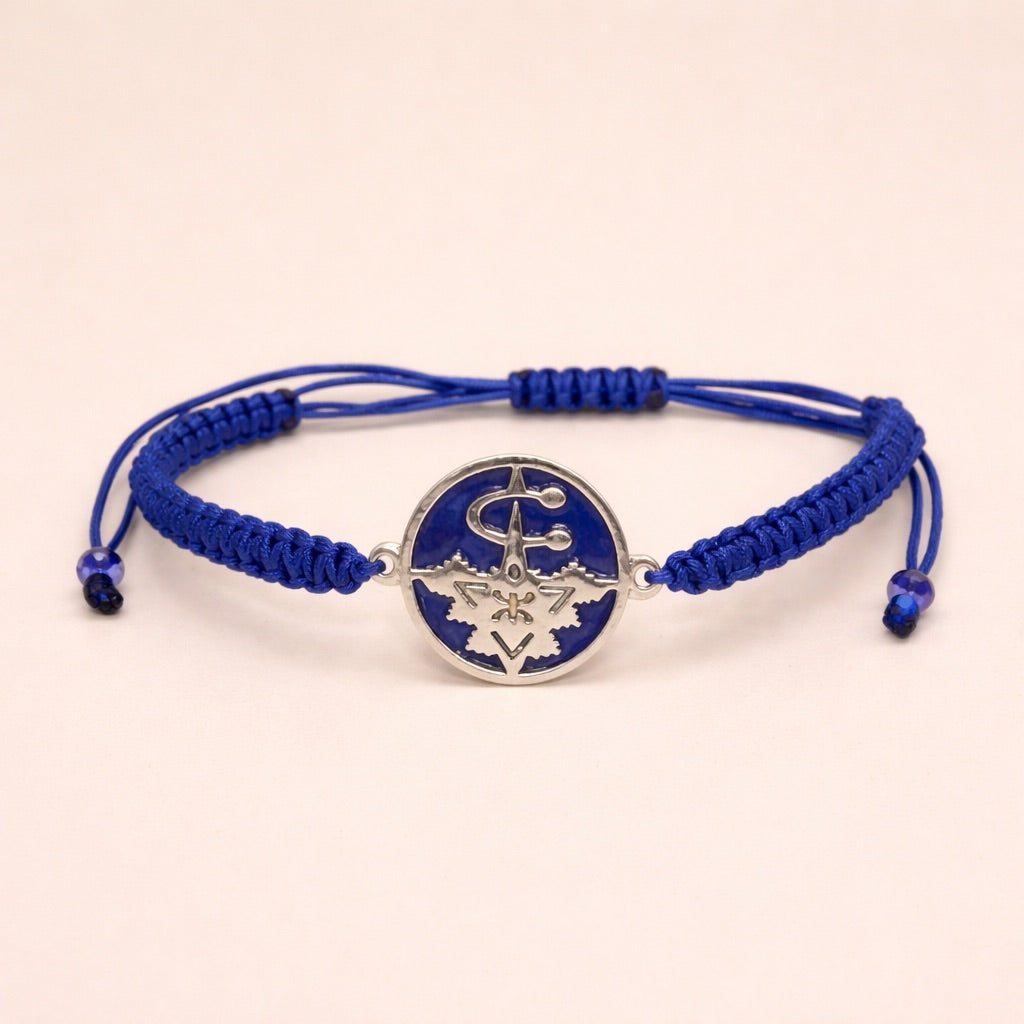 Zirzita adjustable cord bracelet with an artisan-crafted Moroccan silver Amazigh fibula charm.