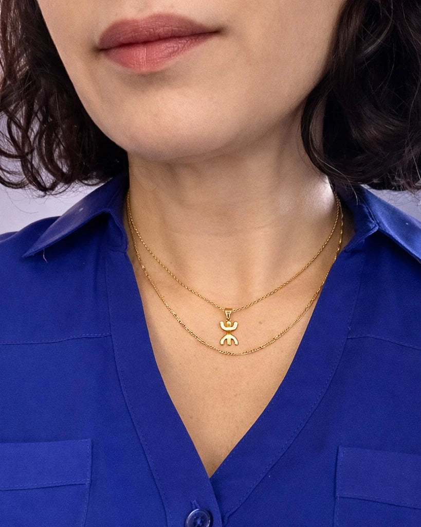 Amzay Yaz pendant necklace in gold and silver finish, 40cm chain with Amazigh symbol.