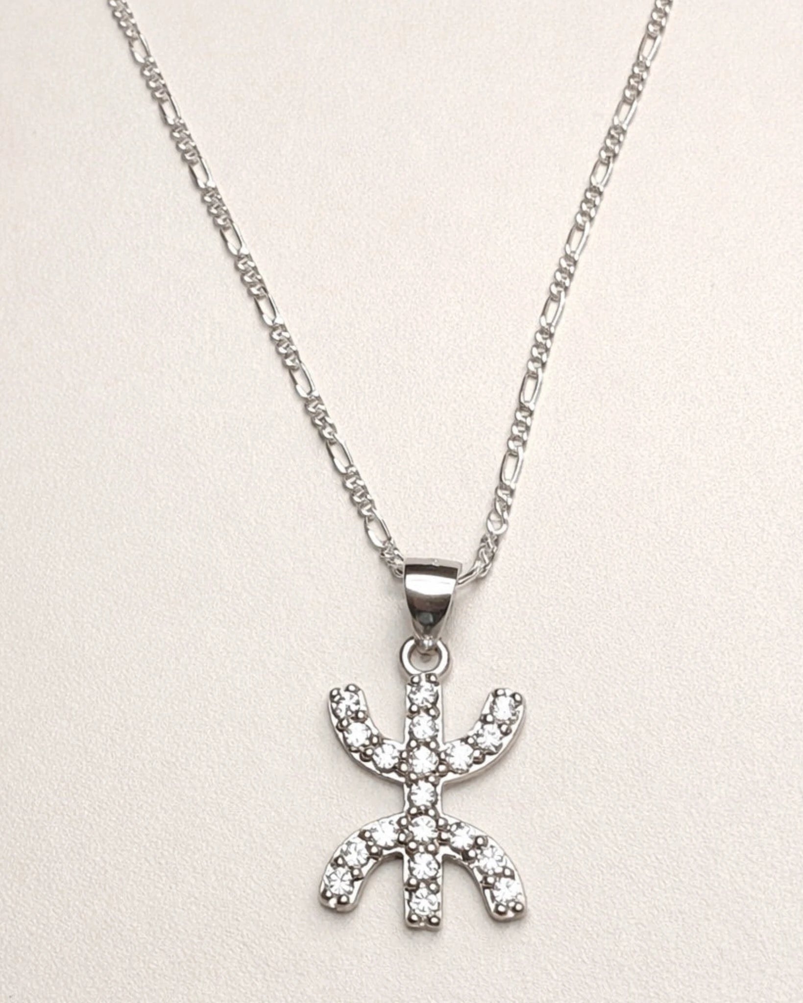 Close-up of Tafat amazigh Yaz silver necklace pendant