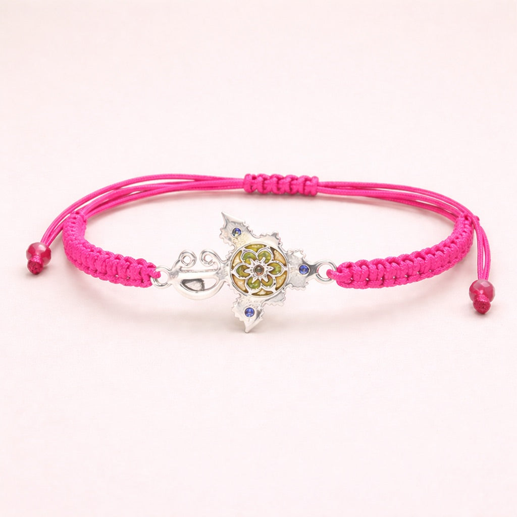 Zirzita adjustable cord bracelet with an artisan-crafted Moroccan silver Amazigh fibula charm.
